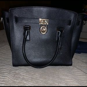 Black Michael kors bag with gold lock